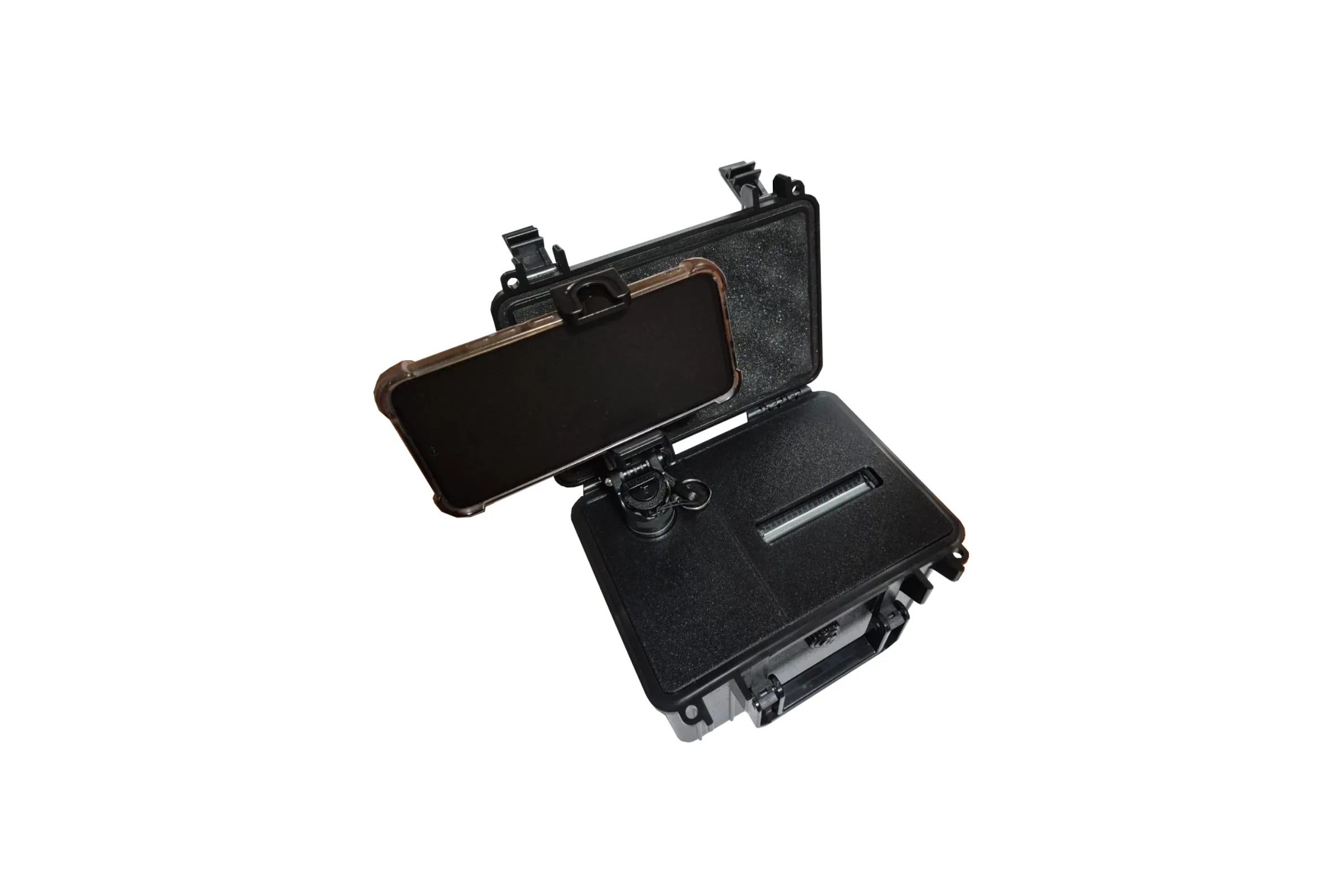 The photobooth open in its hard case: a phone on a mount in the lid, the receipt printer slot in the base.